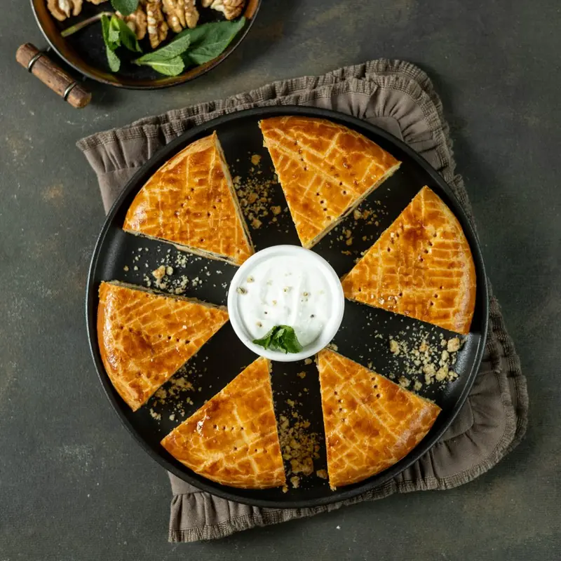 Armenian gata with walnuts and dried fruit, cut into slices